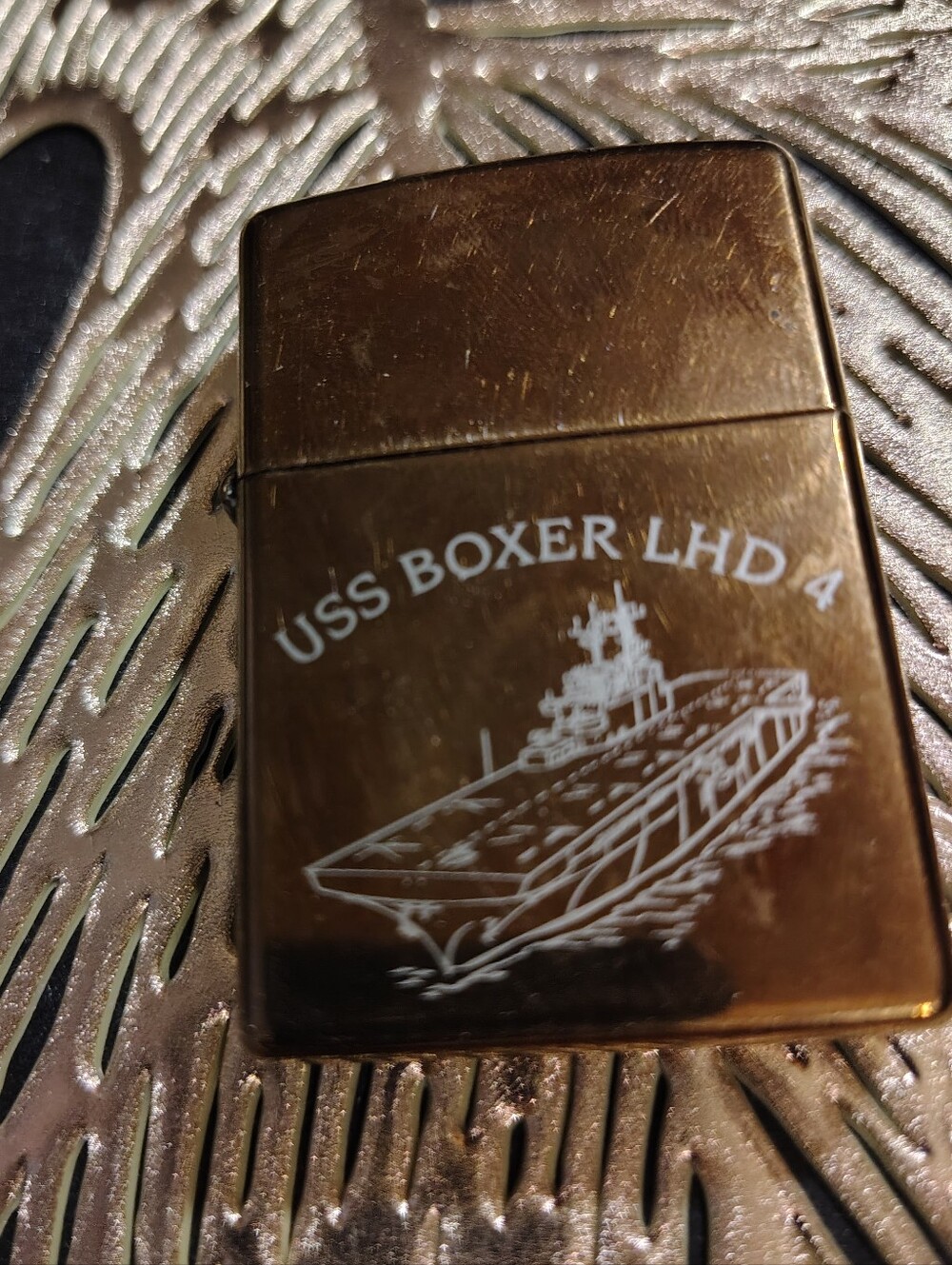 Vintage high polish solid brass Zippo windproof lighter featuring the USS BOXER